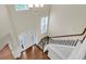 Bright foyer with hardwood floors and a view of the staircase at 213 Roseman Way, Woodstock, GA 30188