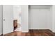 View of open closet space and updated bathroom with wood accents at 3617 Lassiter Rd, Marietta, GA 30062