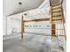 Spacious two-car garage with ample storage space and ladder to upper level at 3617 Lassiter Rd, Marietta, GA 30062