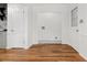 Spacious laundry room features hardwood floors and white trim at 3617 Lassiter Rd, Marietta, GA 30062