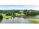 Beautiful bridge extends from a golf course to property in this aerial view at 917 Sundown Pt, Villa Rica, GA 30180