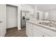 Well-equipped kitchen with granite countertops, stainless steel appliances, and generous pantry space at 917 Sundown Pt, Villa Rica, GA 30180