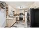 Functional kitchen with painted cabinets, stainless steel appliances, and durable flooring, ideal for everyday cooking at 202 Cedar Valley Ct, Canton, GA 30115
