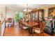 Dining room with hardwood floors and large window at 60 Boardwalk Ave, Covington, GA 30016