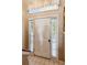 Bright foyer featuring tile flooring and sidelights surrounding the front door at 60 Boardwalk Ave, Covington, GA 30016