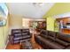 Spacious living room open to dining with hardwood floors and neutral paint at 60 Boardwalk Ave, Covington, GA 30016