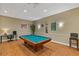 Fun game room with a classic pool table and comfortable seating for relaxation at 1501 Clairmont Rd # 1731, Decatur, GA 30033