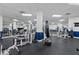 Fully-equipped gym featuring weights, machines, mirrors, and a punching bag at 1501 Clairmont Rd # 1731, Decatur, GA 30033