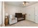 Comfortable Bedroom features a glider and crib for your precious little one at 2238 Parkview Nw Ct, Atlanta, GA 30318