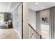 Bright hallway features plush seating, neutral walls, and a staircase at 2238 Parkview Nw Ct, Atlanta, GA 30318