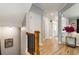 Spacious hallway with hardwood floors, leading to the living areas and staircase at 2238 Parkview Nw Ct, Atlanta, GA 30318