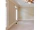 Bright and airy bedroom with neutral carpet and ceiling fan at 2748 Hidden Falls Dr, Buford, GA 30519