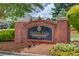 Elegant brick entrance sign for Hidden Falls, a Jim Cowart Residential Community established in 2002 at 2748 Hidden Falls Dr, Buford, GA 30519