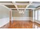 Formal dining room with hardwood floors, coffered ceiling, and wainscoting at 2748 Hidden Falls Dr, Buford, GA 30519