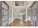 Grand foyer with hardwood floors, staircase, and high ceilings at 2748 Hidden Falls Dr, Buford, GA 30519