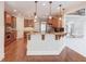 Stylish kitchen with wood cabinets, stainless steel appliances, and granite countertops at 2748 Hidden Falls Dr, Buford, GA 30519