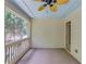 Screened porch with ceiling fan and views of the backyard at 2748 Hidden Falls Dr, Buford, GA 30519