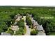 Aerial view of the home at 5059 Belair Bluff nestled in a lush, green neighborhood at 5059 Belair Bluff Se Ct, Smyrna, GA 30126