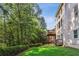 Backyard view showing lawn, trees, and deck at 5059 Belair Bluff Se Ct, Smyrna, GA 30126