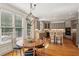 Eat-in kitchen featuring hardwood floors, a chandelier, and ample cabinet space at 5059 Belair Bluff Se Ct, Smyrna, GA 30126