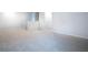 Upstairs hallway with carpet flooring and view of doors to bedrooms at 904 Sundown Pt, Villa Rica, GA 30180