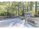 Wood deck overlooks the backyard and small guesthouse at 1373 W Prospect Dr, Lawrenceville, GA 30043