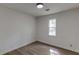 Cozy bedroom with hardwood flooring, natural light and neutral paint creates a relaxing atmosphere at 1373 W Prospect Dr, Lawrenceville, GA 30043