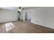 Spacious living room with hardwood floors and neutral walls allows for seamless design and comfortable living at 1373 W Prospect Dr, Lawrenceville, GA 30043