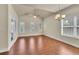 Bright and airy living room with hardwood floors and vaulted ceilings at 1550 Rolling View Dr, Cumming, GA 30040
