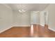 Spacious living area featuring hardwood floors and neutral walls for versatile decorating and entertaining at 1550 Rolling View Dr, Cumming, GA 30040