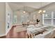 Bright and airy living room with hardwood floors, vaulted ceilings, and modern furnishings at 1550 Rolling View Dr, Cumming, GA 30040