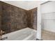 Bathroom with tiled shower and linen closet at 425 Chapel Sw St # 1211, Atlanta, GA 30313