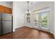 Cozy dining area with modern light fixture and balcony access at 425 Chapel Sw St # 1211, Atlanta, GA 30313