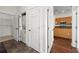 Hallway leading to laundry closet and kitchen area at 425 Chapel Sw St # 1211, Atlanta, GA 30313