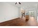 View of open concept living room with hardwood floors and view into the kitchen with island at 425 Chapel Sw St # 1211, Atlanta, GA 30313