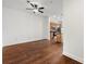 Open concept living room with hardwood floors and view into the kitchen with island at 425 Chapel Sw St # 1211, Atlanta, GA 30313