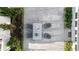 Aerial view of backyard patio with outdoor seating, manicured landscaping, and a peaceful ambiance at 6820 Colfax Ave, Cumming, GA 30040