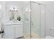 Modern bathroom featuring a glass-enclosed shower and stylish vanity at 6820 Colfax Ave, Cumming, GA 30040
