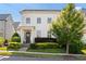 Charming home with a welcoming front entrance, complemented by manicured landscaping and a well-kept lawn at 6820 Colfax Ave, Cumming, GA 30040