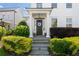 Inviting entrance with classic columns and a beautifully decorated front door at 6820 Colfax Ave, Cumming, GA 30040