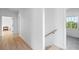 Bright hallway with views to bathroom and bedroom at 6820 Colfax Ave, Cumming, GA 30040