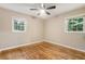 Empty bedroom featuring hardwood floors, neutral walls, and plenty of natural light at 2775 Belleau Se Ln, Atlanta, GA 30316