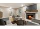 Living room offers a brick fireplace and hardwood floors at 2775 Belleau Se Ln, Atlanta, GA 30316