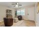 Inviting sitting area boasting hardwood floors, a ceiling fan, natural light, and comfortable seating at 2775 Belleau Se Ln, Atlanta, GA 30316