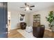 Bright sitting area featuring hardwood floors, stylish decor, and natural light streaming through the doorway at 2775 Belleau Se Ln, Atlanta, GA 30316