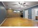 Finished basement features hardwood floors, a brick wall, and a bar area at 1605 Pavillion Ridge Se Dr, Smyrna, GA 30080