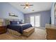 Spacious main bedroom with vaulted ceiling, natural light, and plush carpeting at 1605 Pavillion Ridge Se Dr, Smyrna, GA 30080