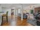 Open basement floor plan with wood floors, bar area, and living room area at 162 Nouveau Sw Ct, Lilburn, GA 30047