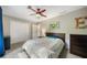 Bedroom featuring ample closet space and a large window for natural light at 162 Nouveau Sw Ct, Lilburn, GA 30047