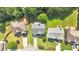 An aerial view shows homes with manicured lawns and driveways at 290 Prescott Dr, Acworth, GA 30101